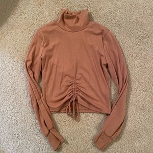 Salmon vestique turtle neck